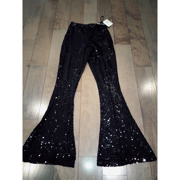 black glitter flared trousers